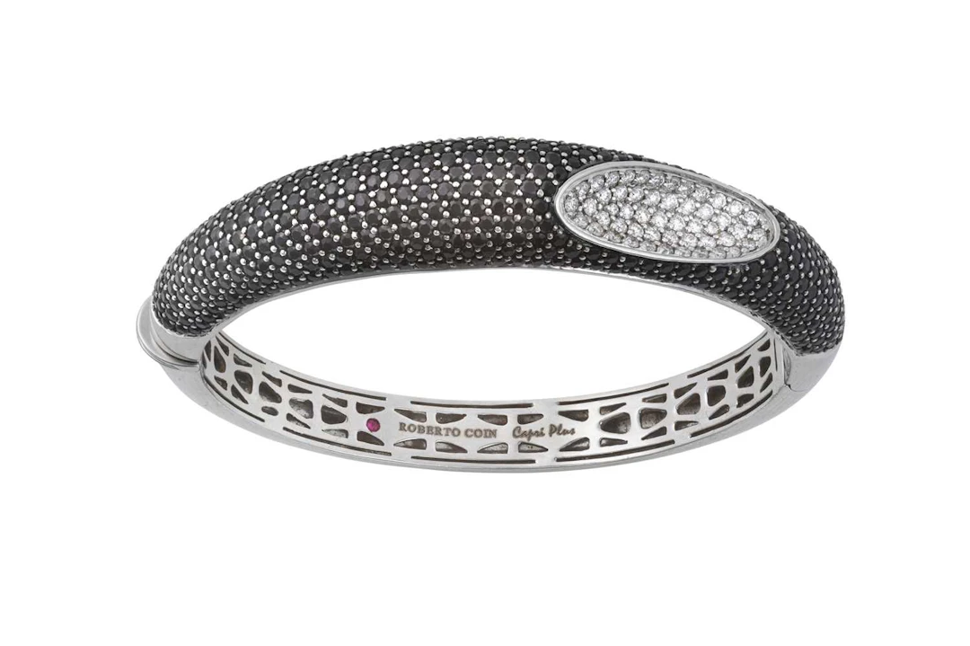 An 18 Carat White Gold Sapphire and Diamond Hinged Bangle, by Roberto Coin