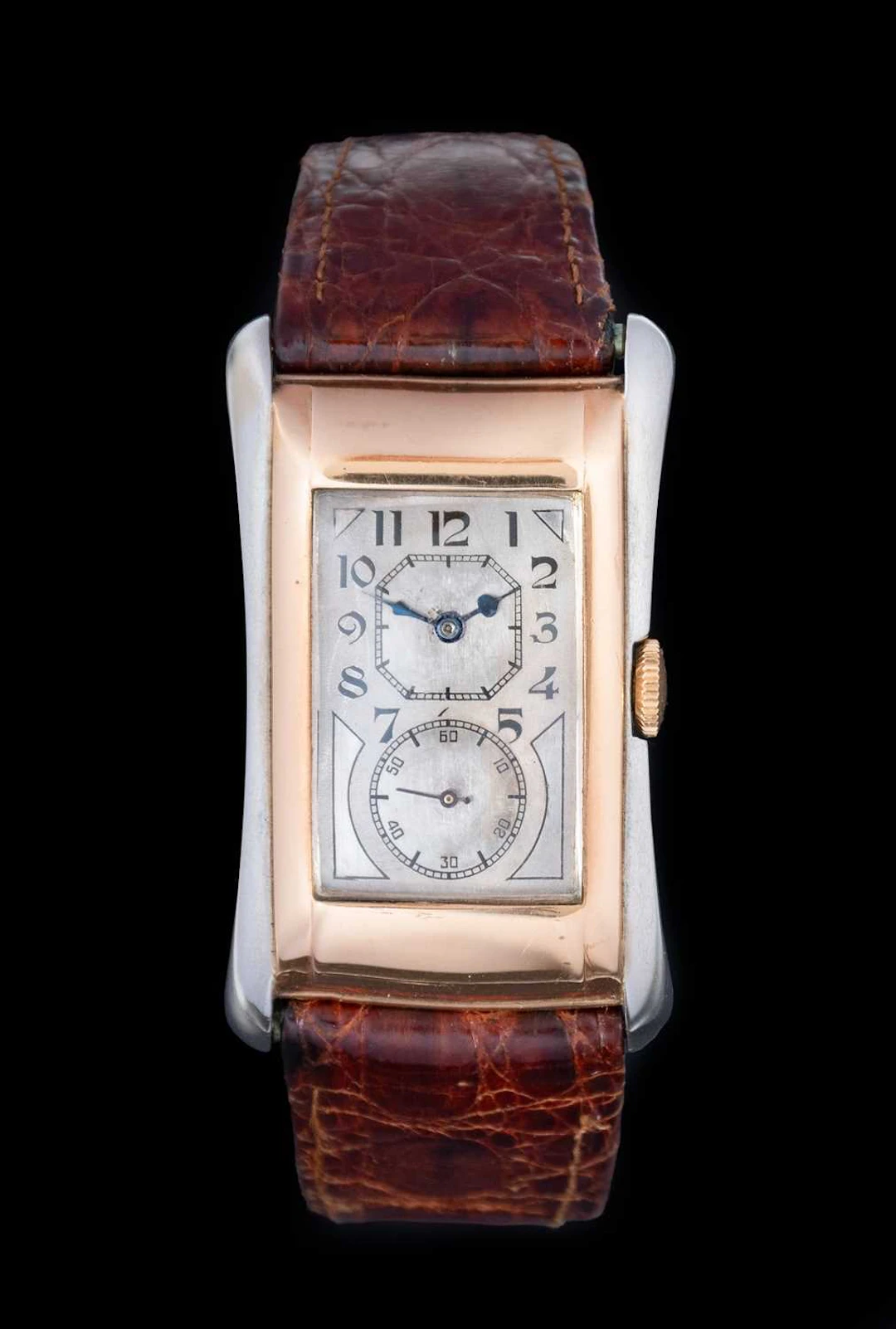 Rolex: A 9 Carat Yellow and White Gold Flared Sided Rectangular Wristwatch