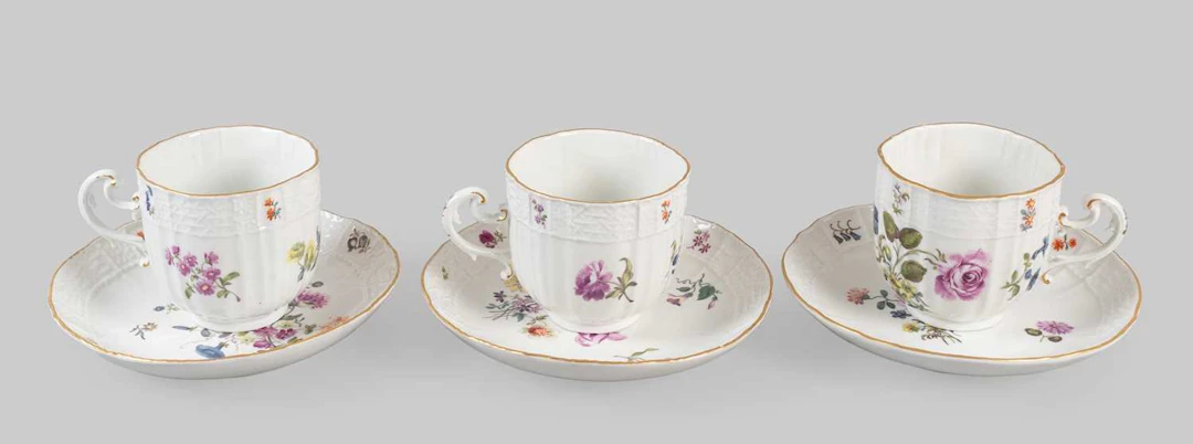A Set of Three Meissen Porcelain Coffee Cups and Saucers, circa 1750