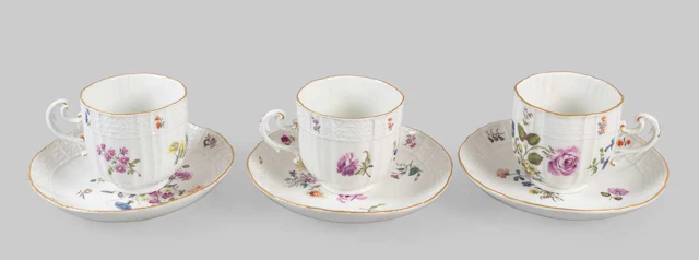 A Set of Three Meissen Porcelain Coffee Cups and Saucers, circa 1750
