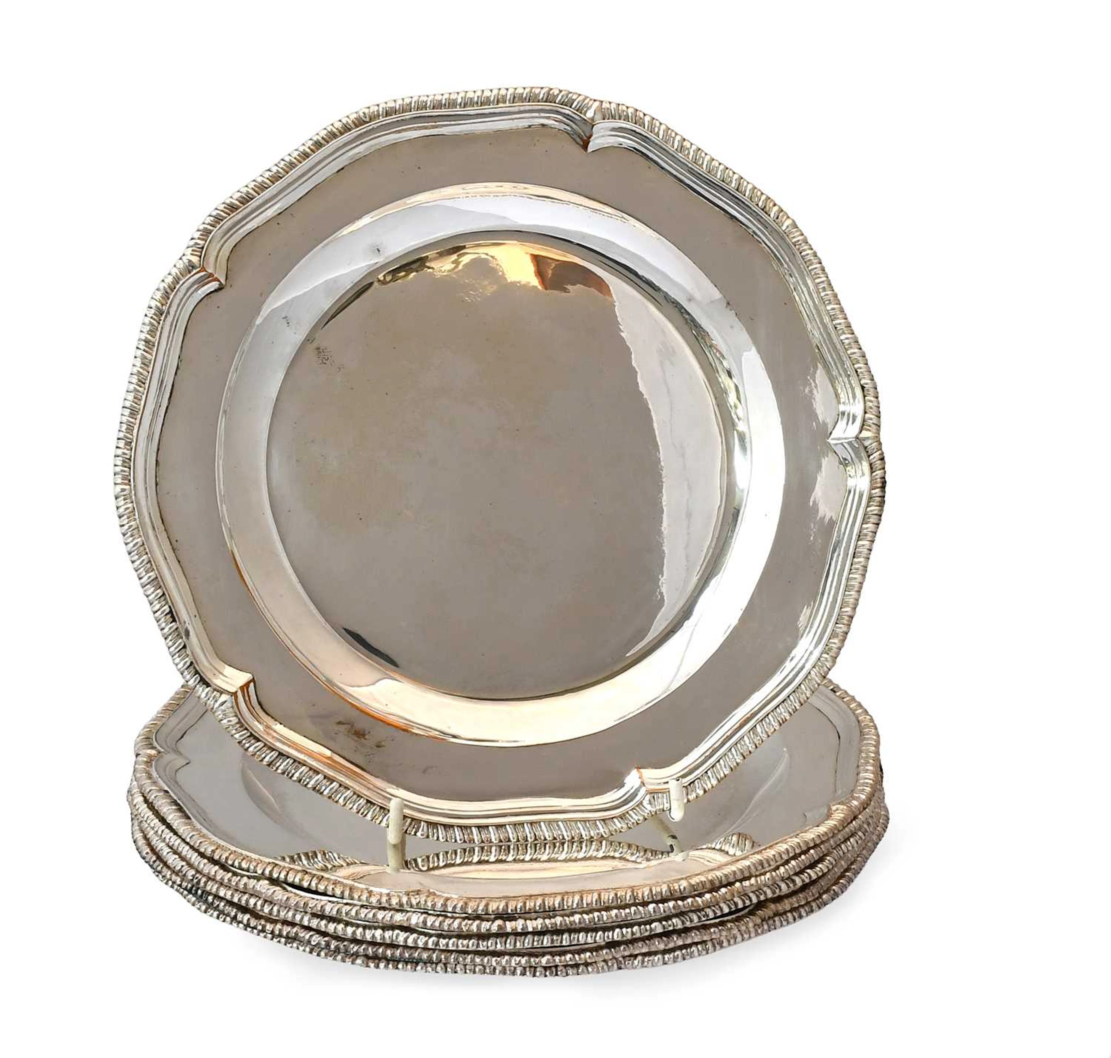 A Set of Six Silver Plate Soup-Plates