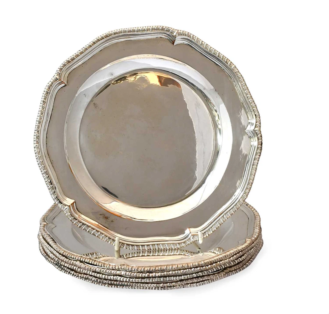 A Set of Six Silver Plate Soup-Plates