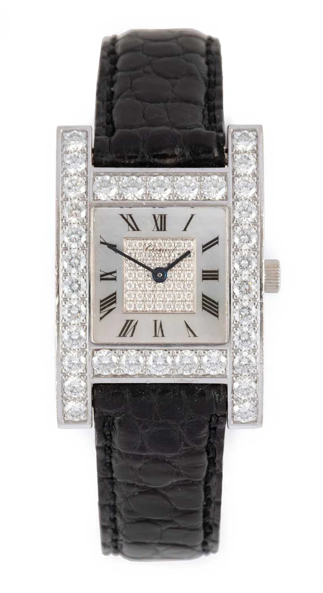 Chopard: A Lady's 18 Carat White Gold Diamond Set Wristwatch, signed