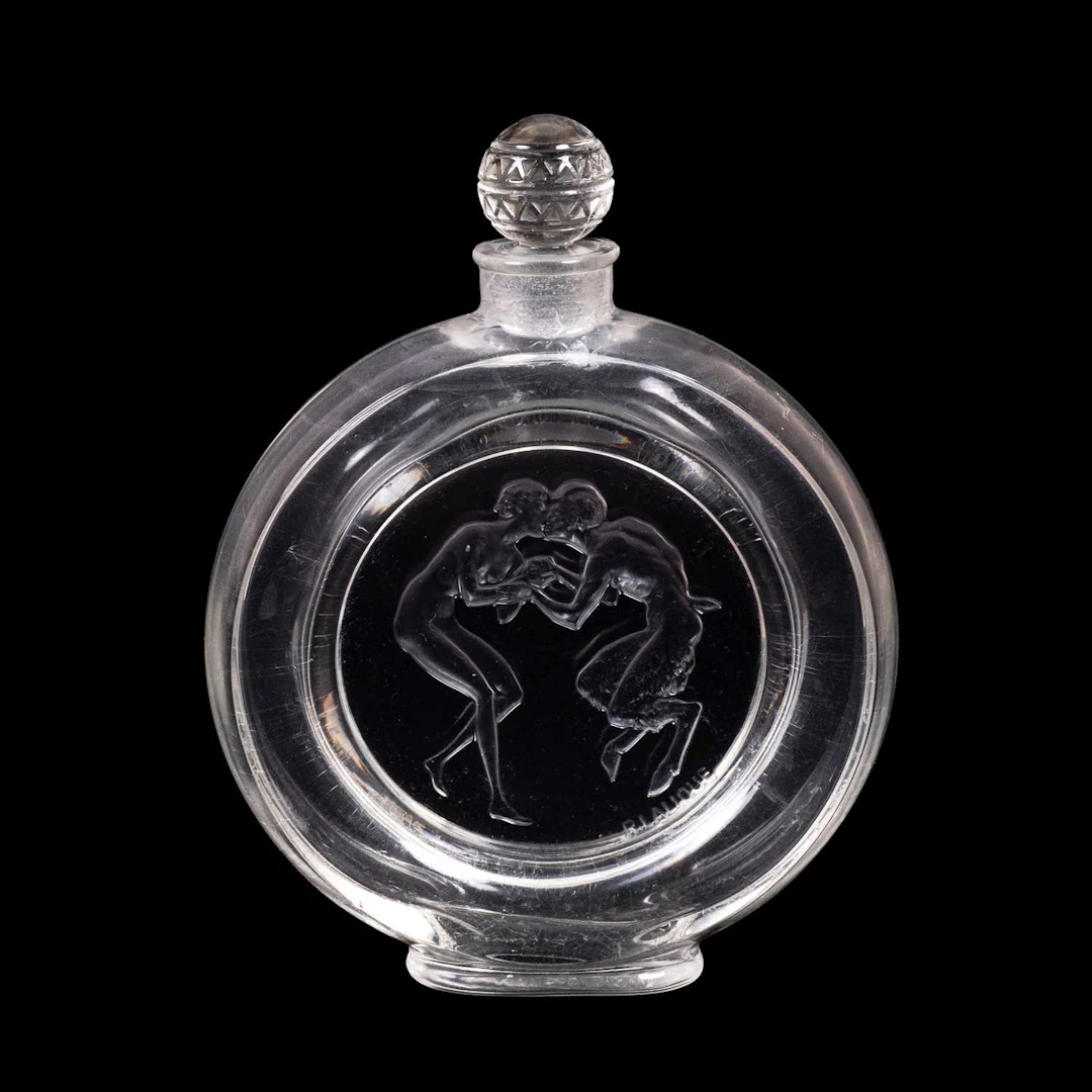 René Lalique (French, 1860-1945): A Le Baiser du Faune 2 Perfume Bottle