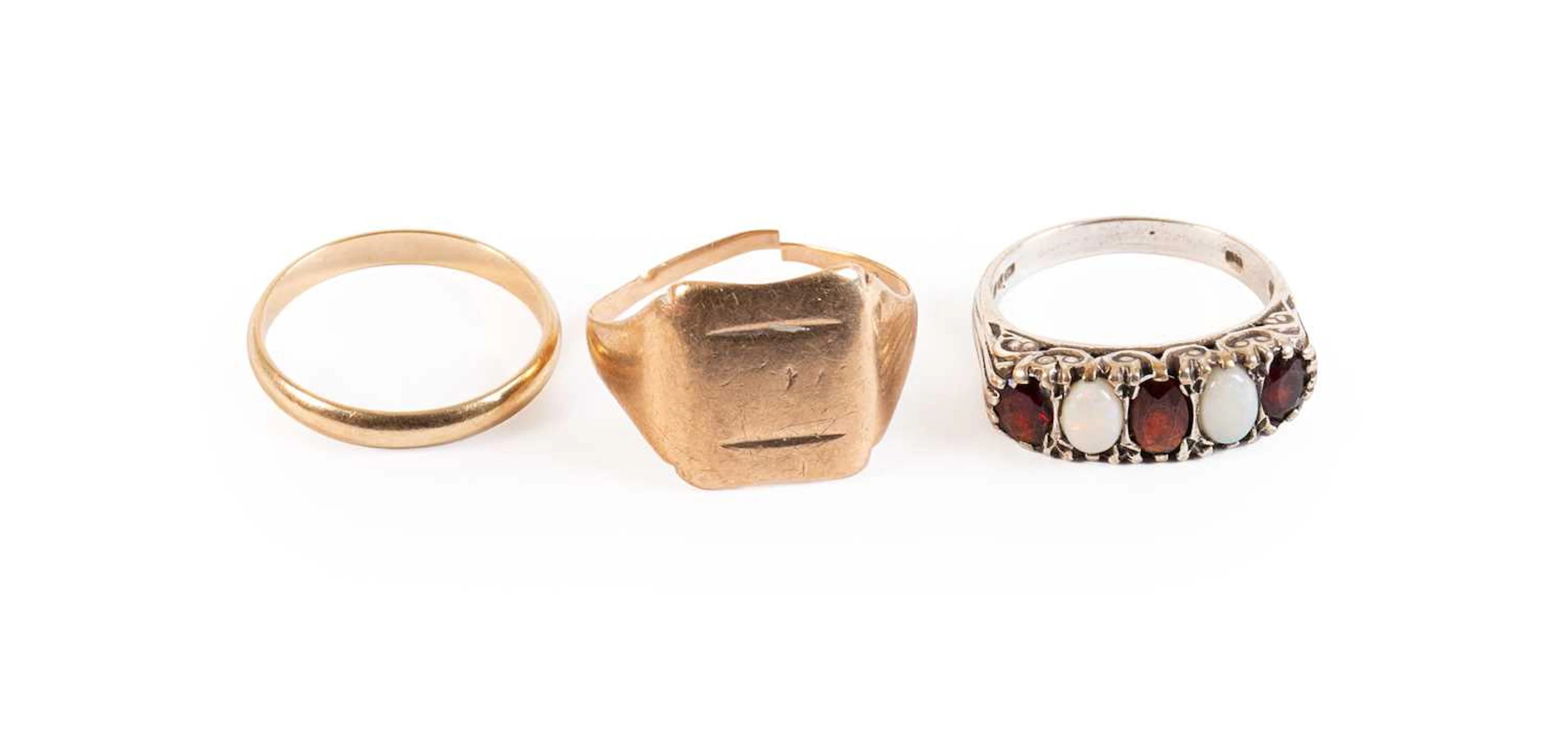 A 9 Carat Gold Band Ring, A Signet Ring, A Silver Garnet and Opal Ring