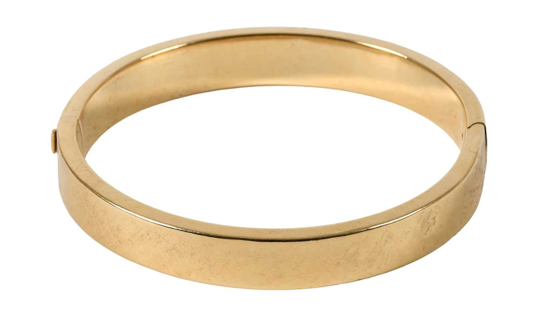 A 9 Carat Gold Hinged Bangle