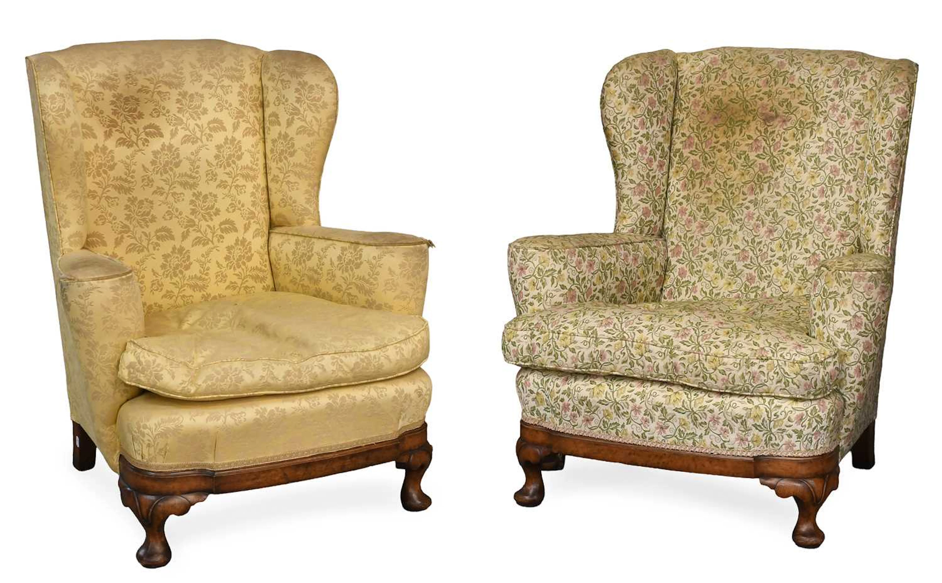 A Pair of Walnut-Framed Wingback Armchairs