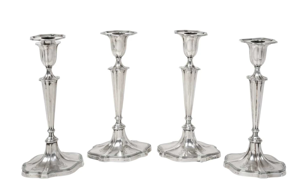 A Set of Four Edward VII Silver Candlesticks by Goldsmiths and Silversmiths