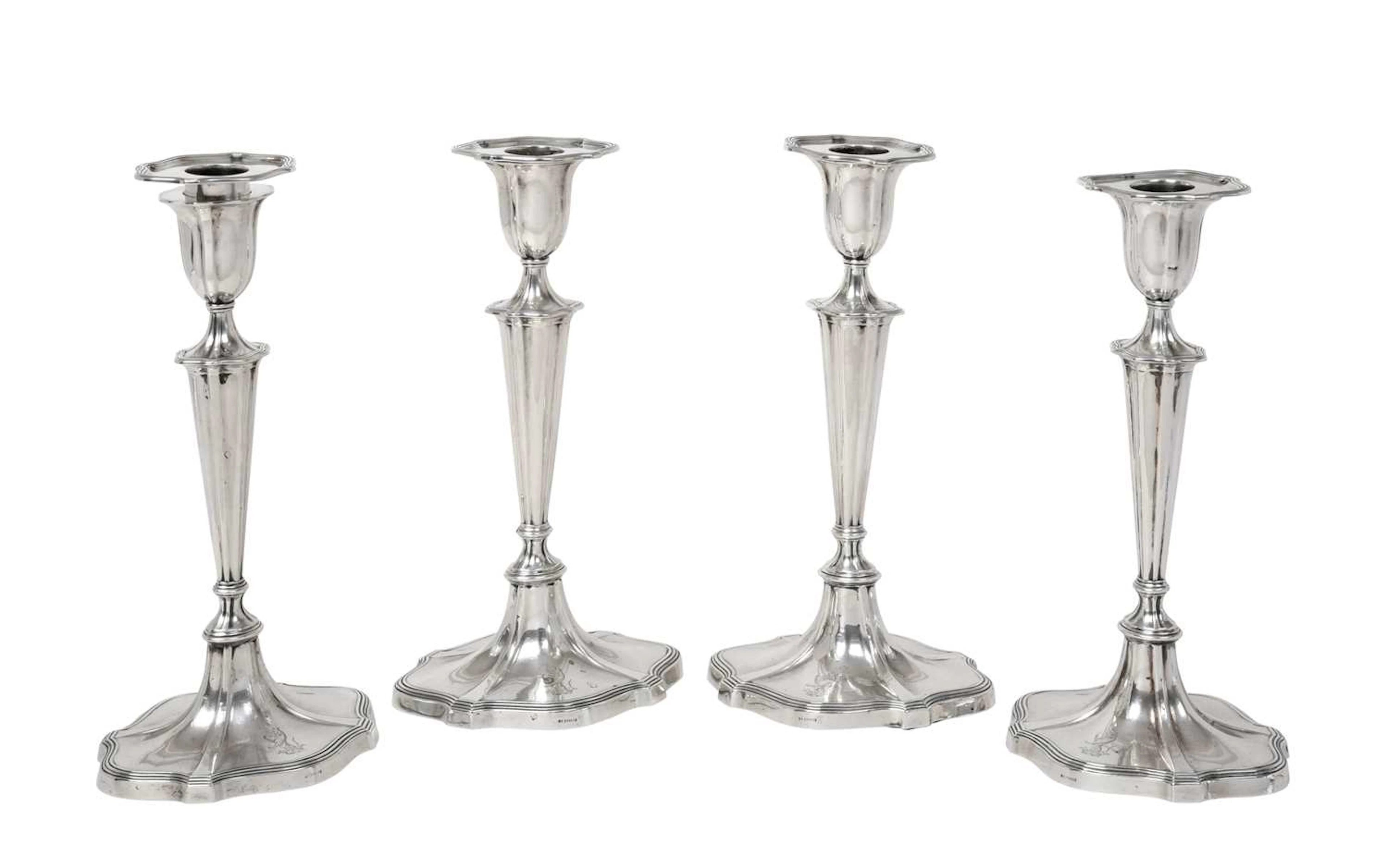 A Set of Four Edward VII Silver Candlesticks by Goldsmiths and Silversmiths