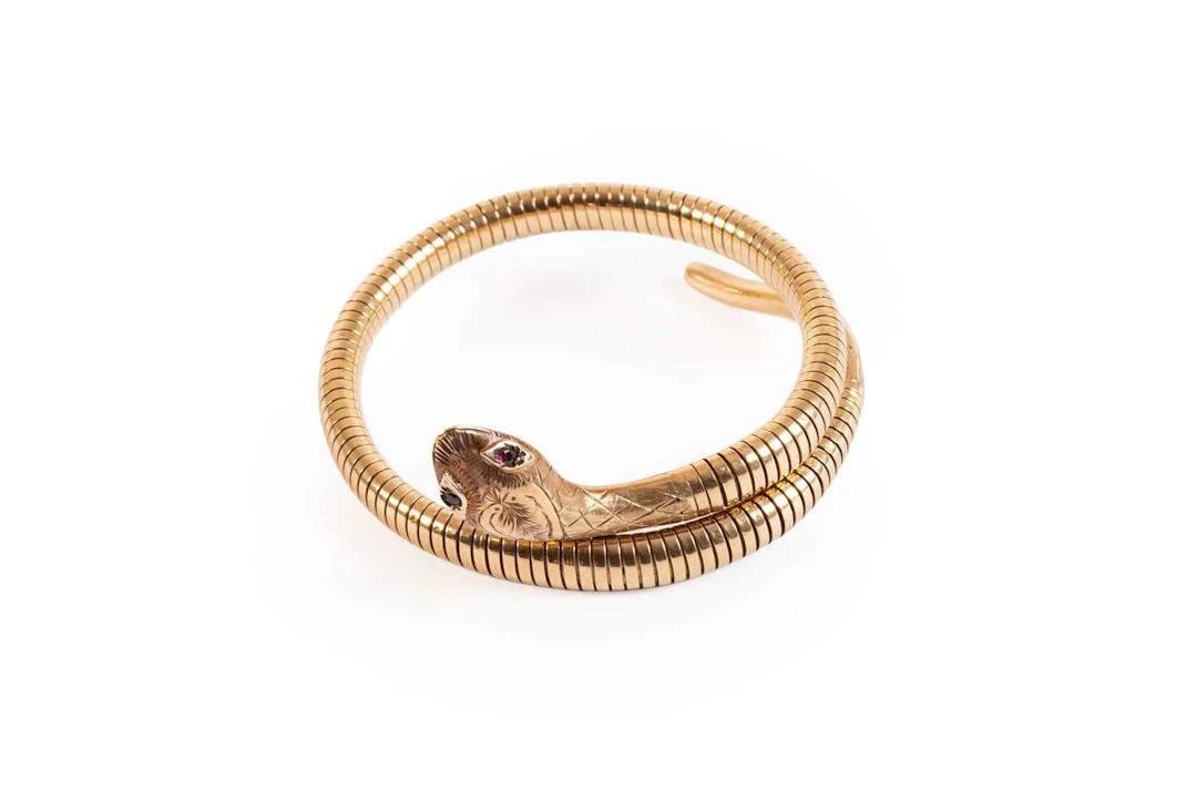 A 9 Carat Gold Snake Bangle