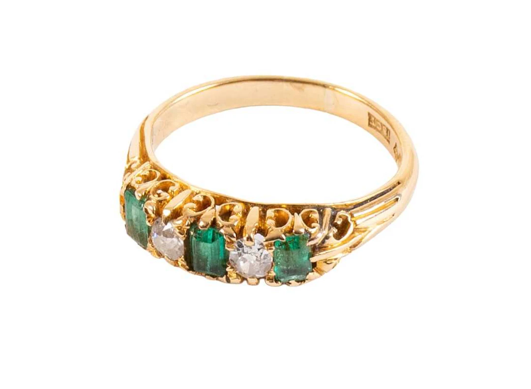 An Emerald and Diamond Ring