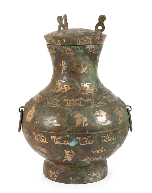 A Chinese Bronze Ritual Wine Vessel and Cover, Hu