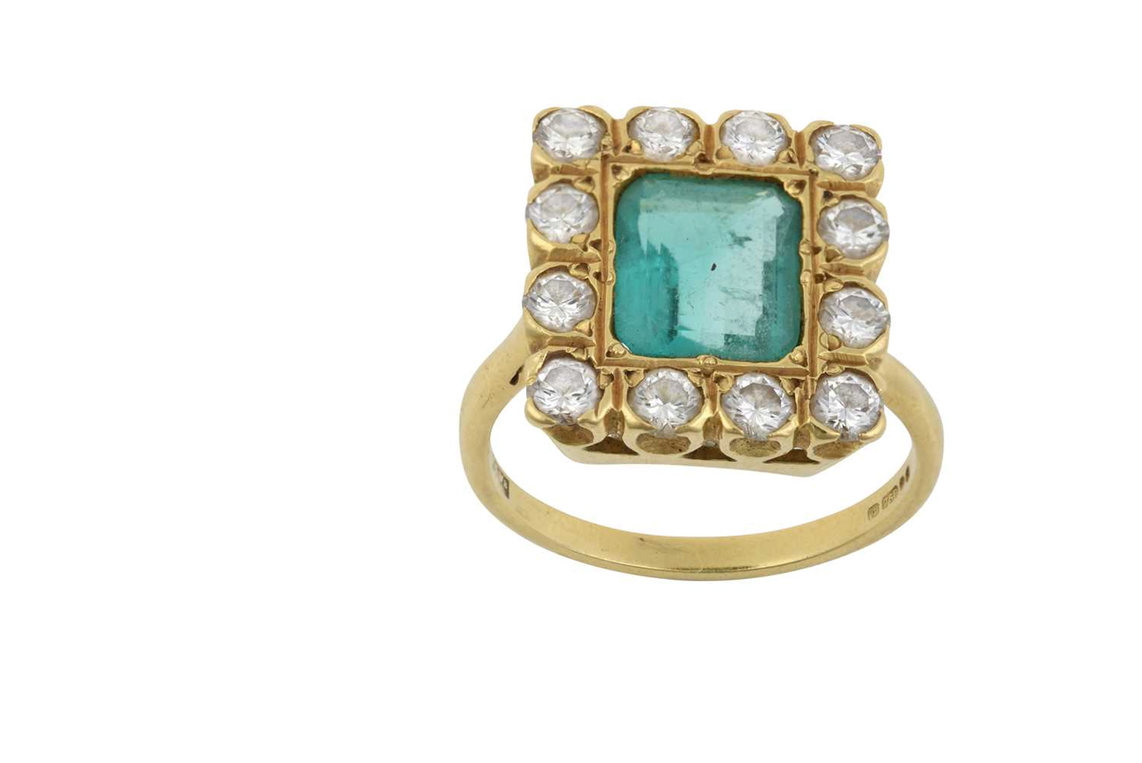 An 18 Carat Emerald and Diamond Cluster Ring, by Mappin and Webb