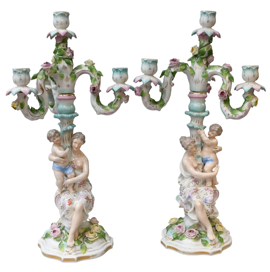 A Pair of German Porcelain Figural Four-Light Candelabra, 19th century