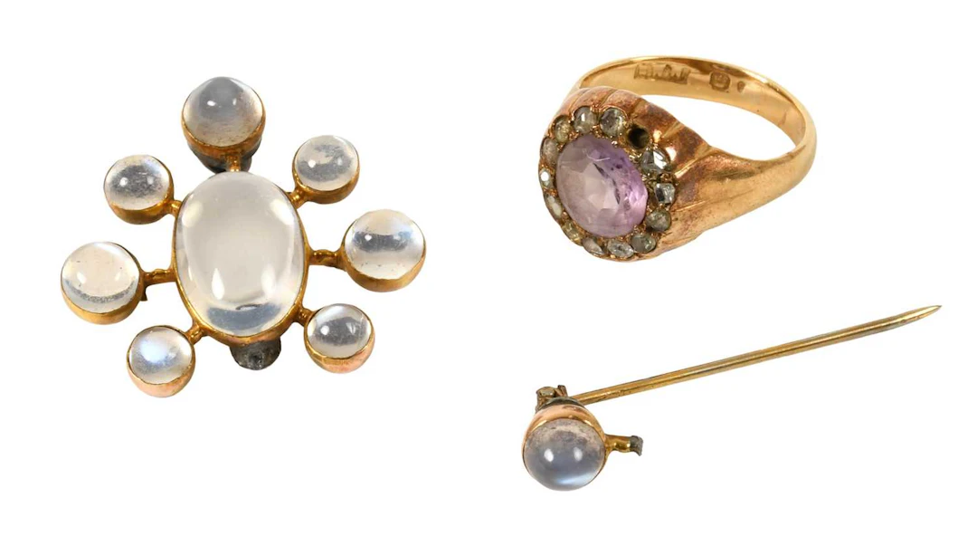A Moonstone Brooch, an Amethyst and Diamond Cluster Ring