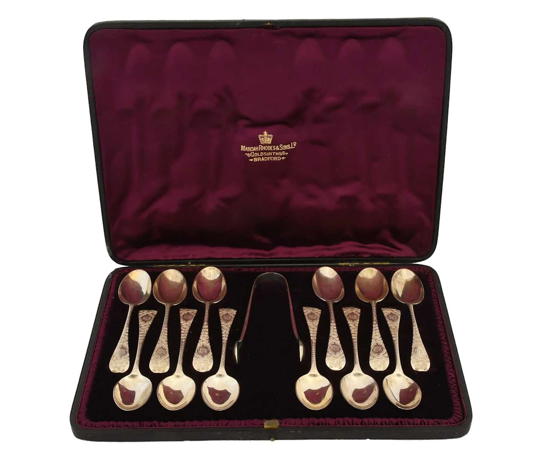 A Cased Set of Twelve Victorian Silver Teaspoons and a Pair of Sugar-Tongs