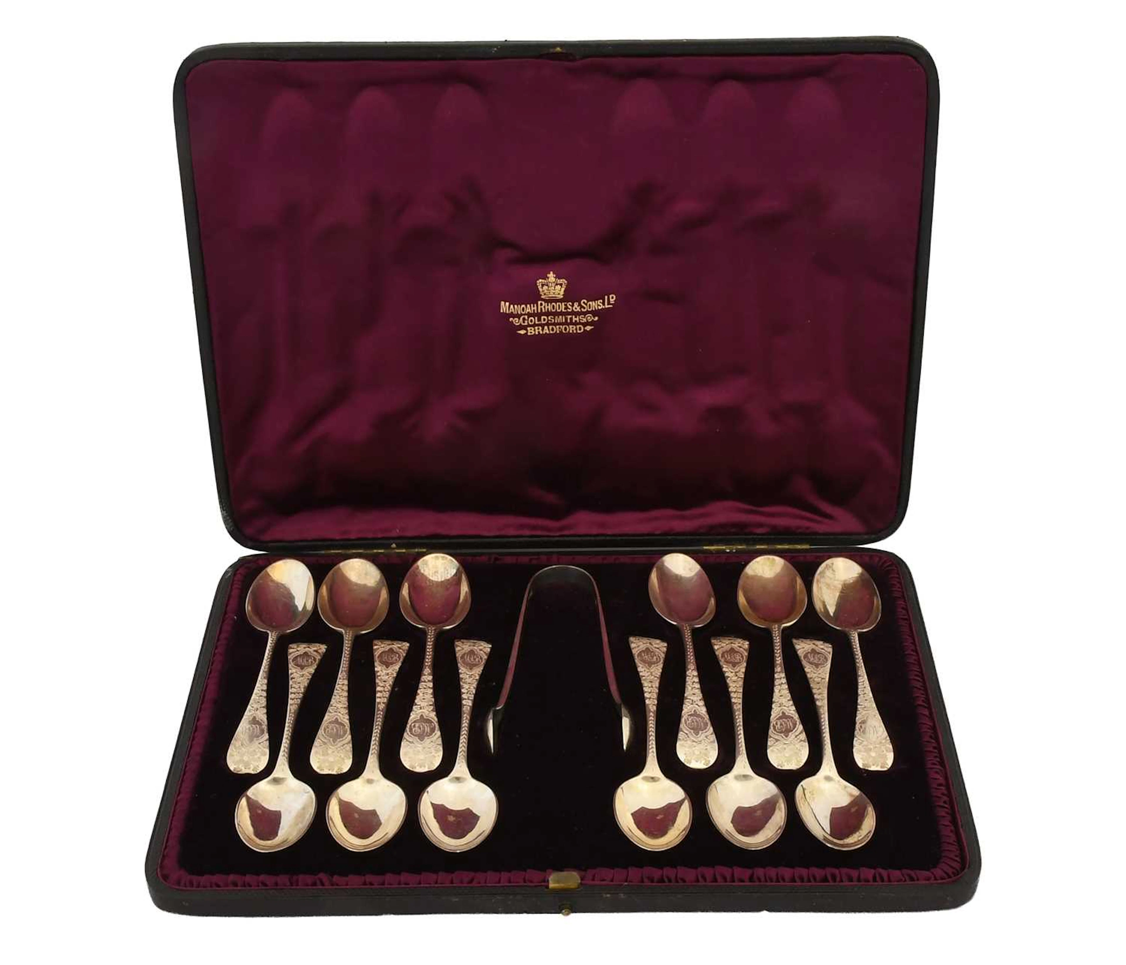 A Cased Set of Twelve Victorian Silver Teaspoons and a Pair of Sugar-Tongs