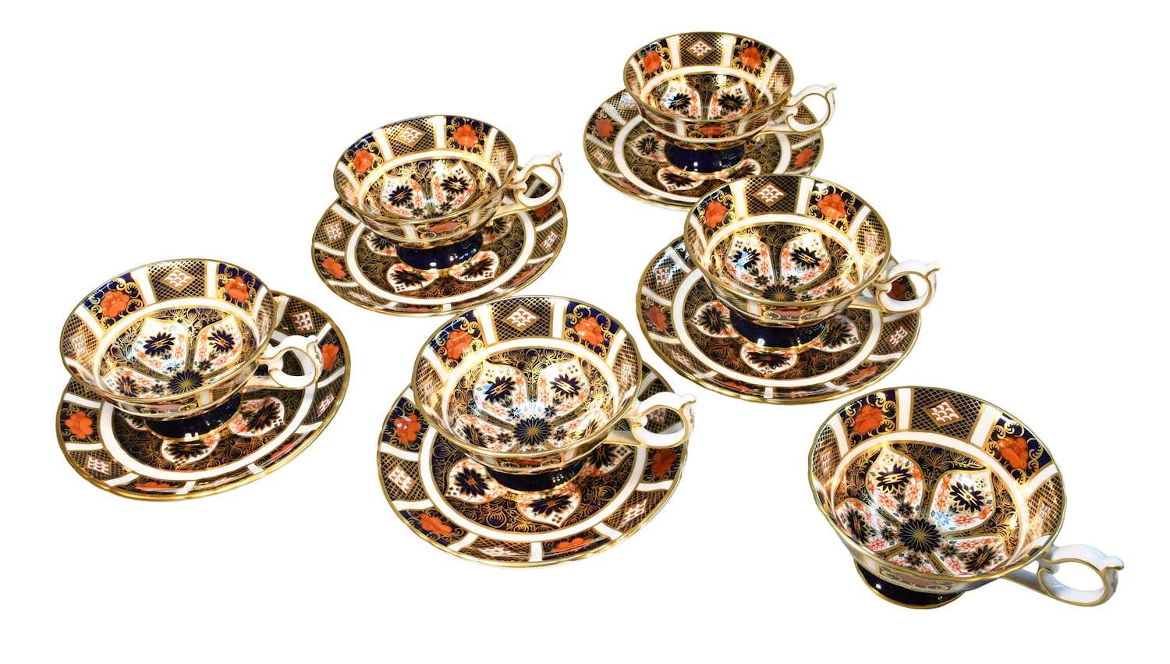 A Set of Six Royal Crown Derby Porcelain Teacups and Five Saucers