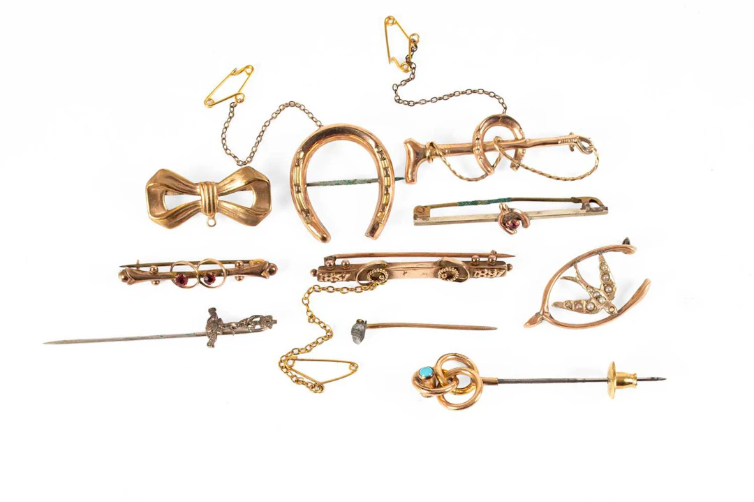 A 9 Carat Gold Victorian Brooch, Six Other Brooches, Two Stick Pins