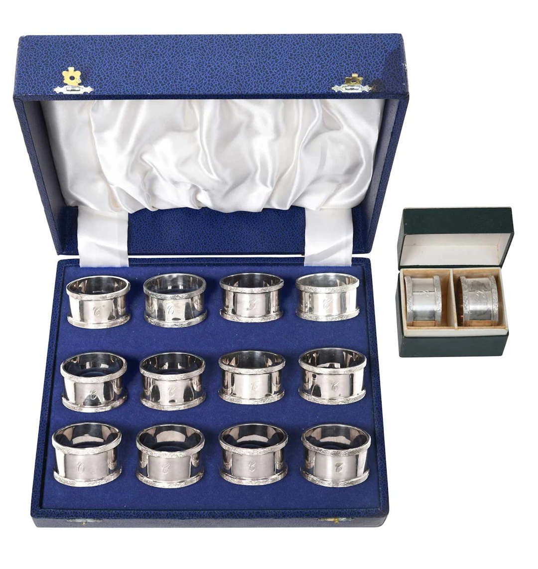 A Set of Fourteen Elizabeth II Silver Napkin-Rings by F. Drury Ltd.