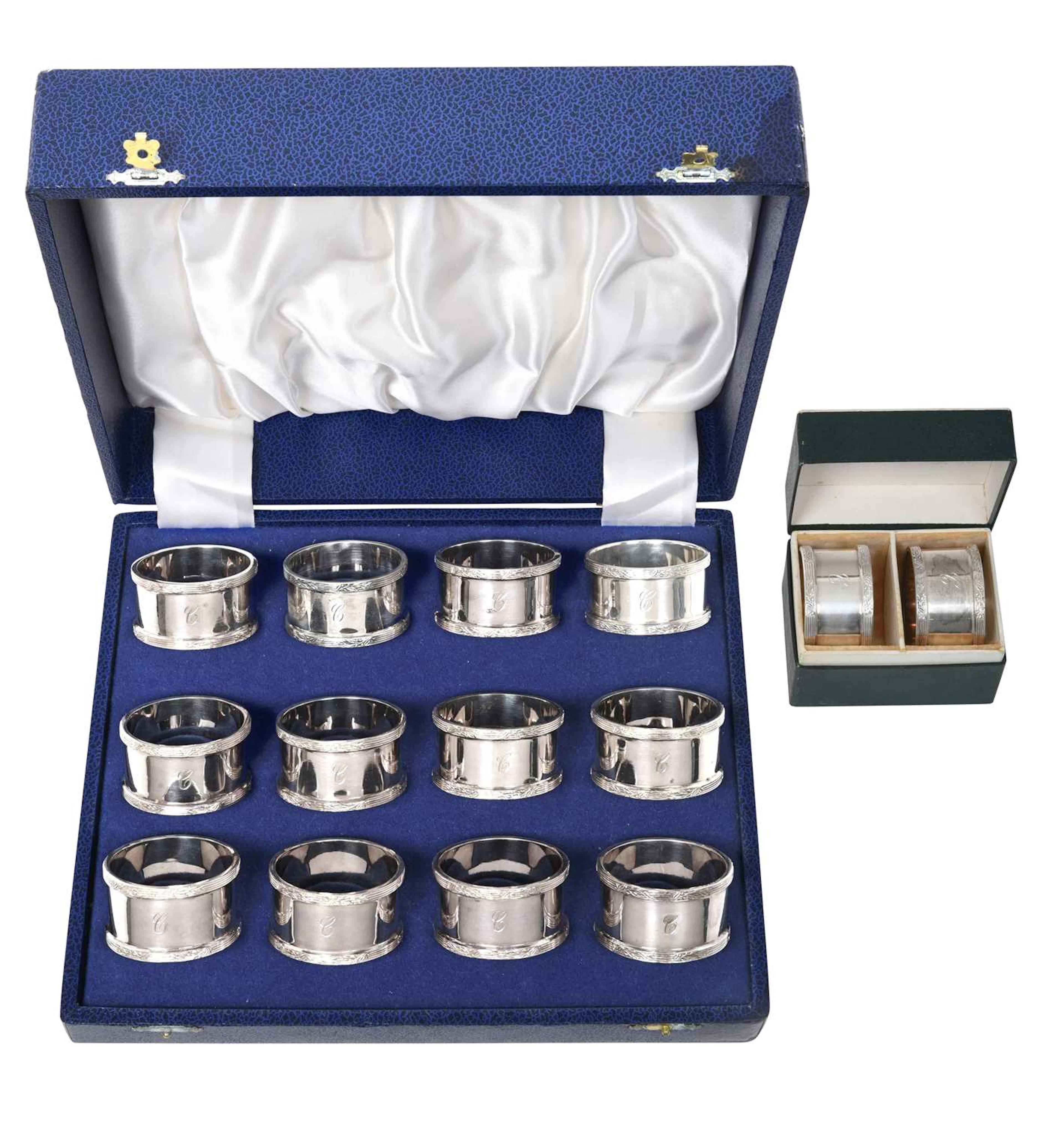 A Set of Fourteen Elizabeth II Silver Napkin-Rings by F. Drury Ltd.