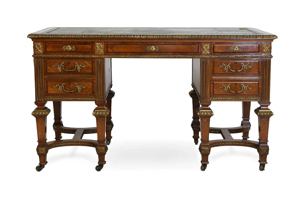A Fine English Kingwood and Gilt-Metal-Mounted Kneehole Desk or Bureau