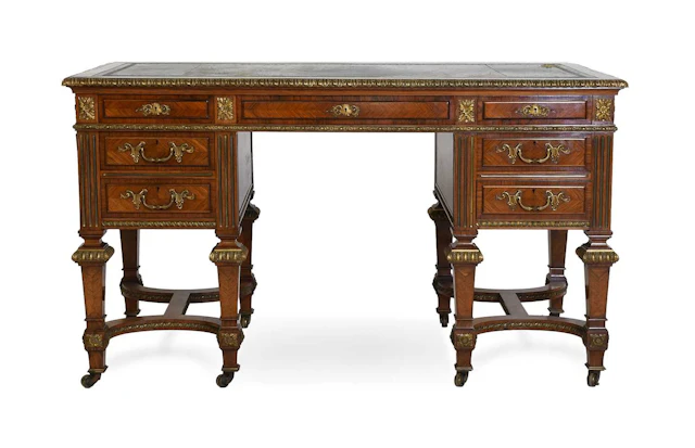A Fine English Kingwood and Gilt-Metal-Mounted Kneehole Desk or Bureau