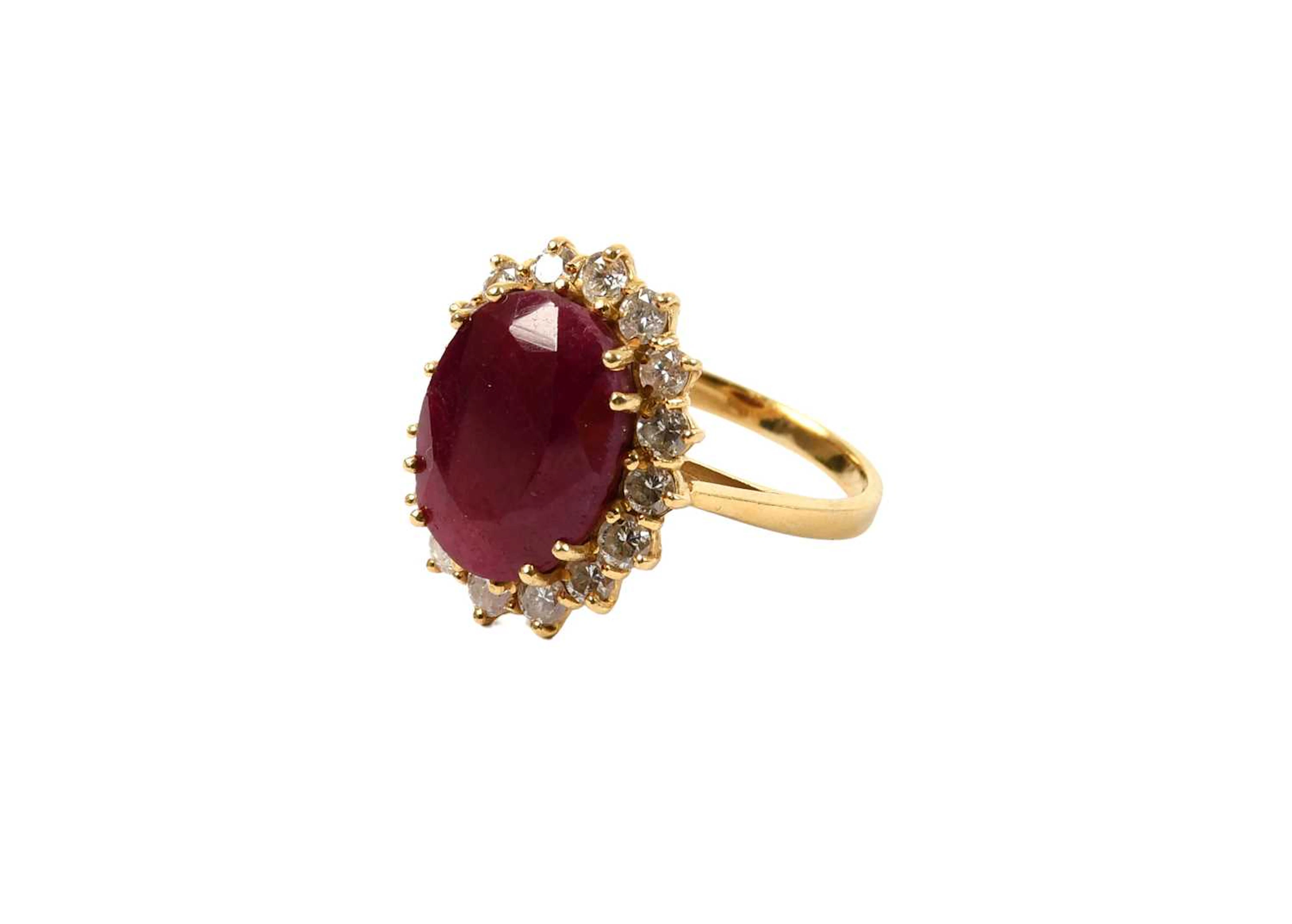 An 18 Carat Gold Ruby and Diamond Cluster Ring
