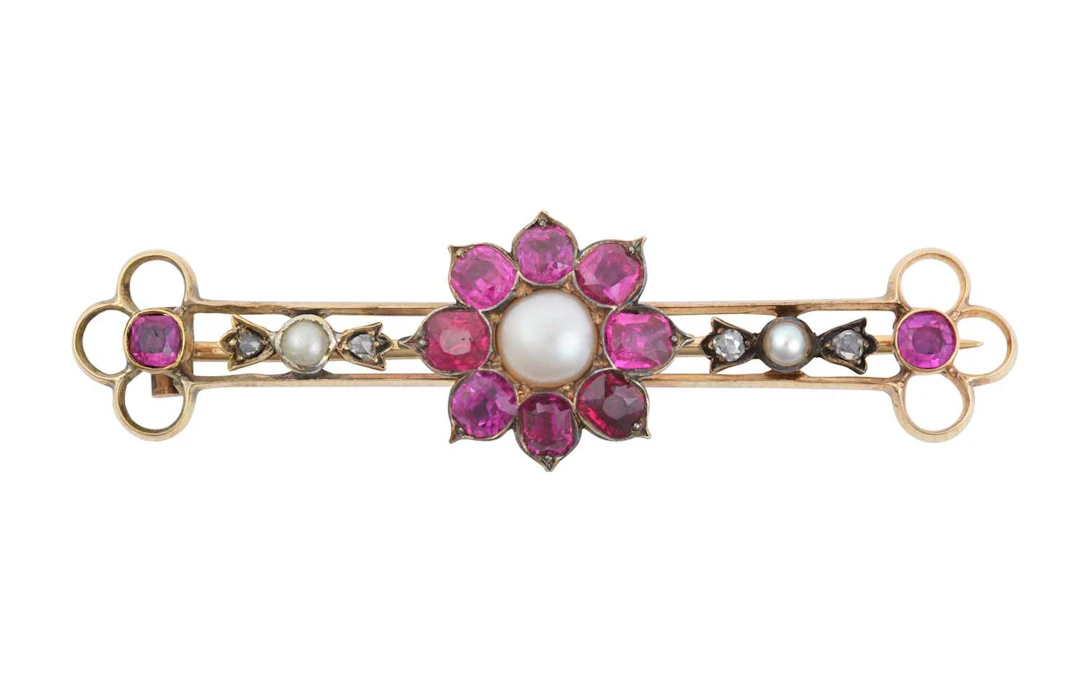 A Ruby, Diamond and Split Pearl Bar Brooch