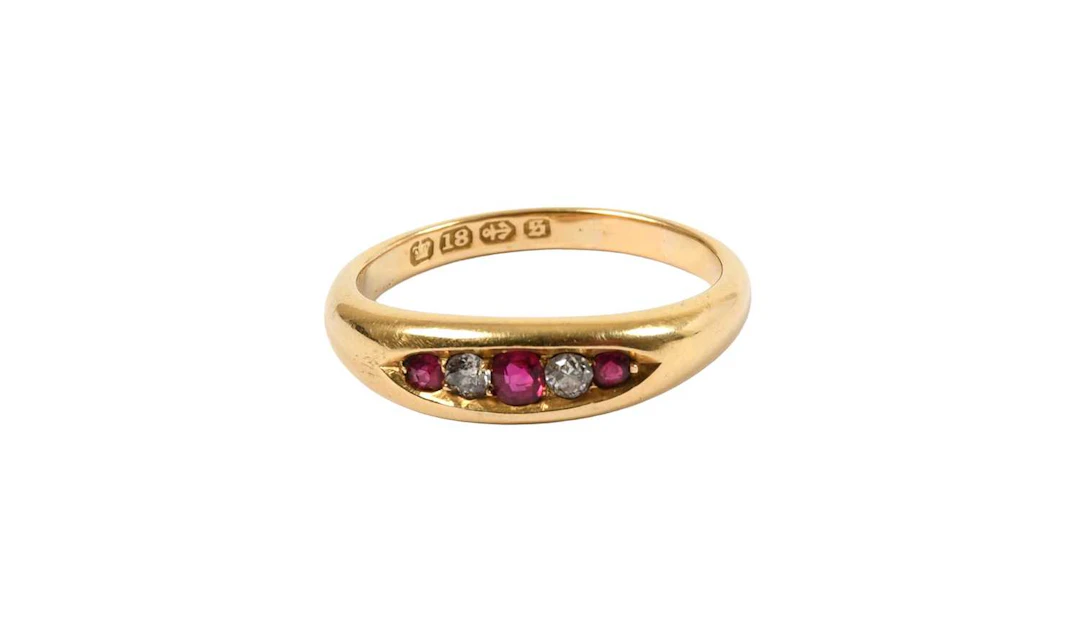 An 18 Carat Gold Ruby and Diamond Five Stone Ring