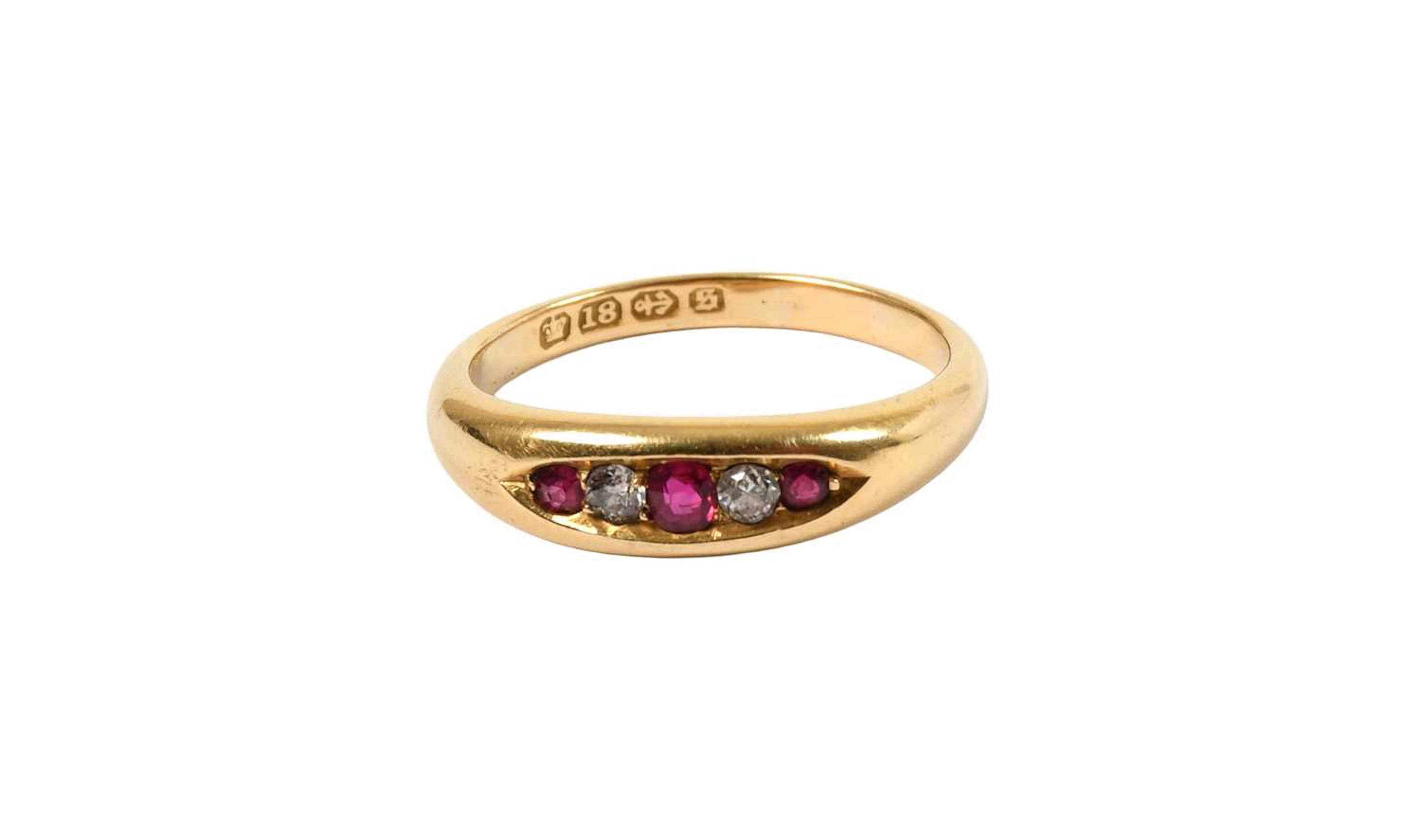 An 18 Carat Gold Ruby and Diamond Five Stone Ring