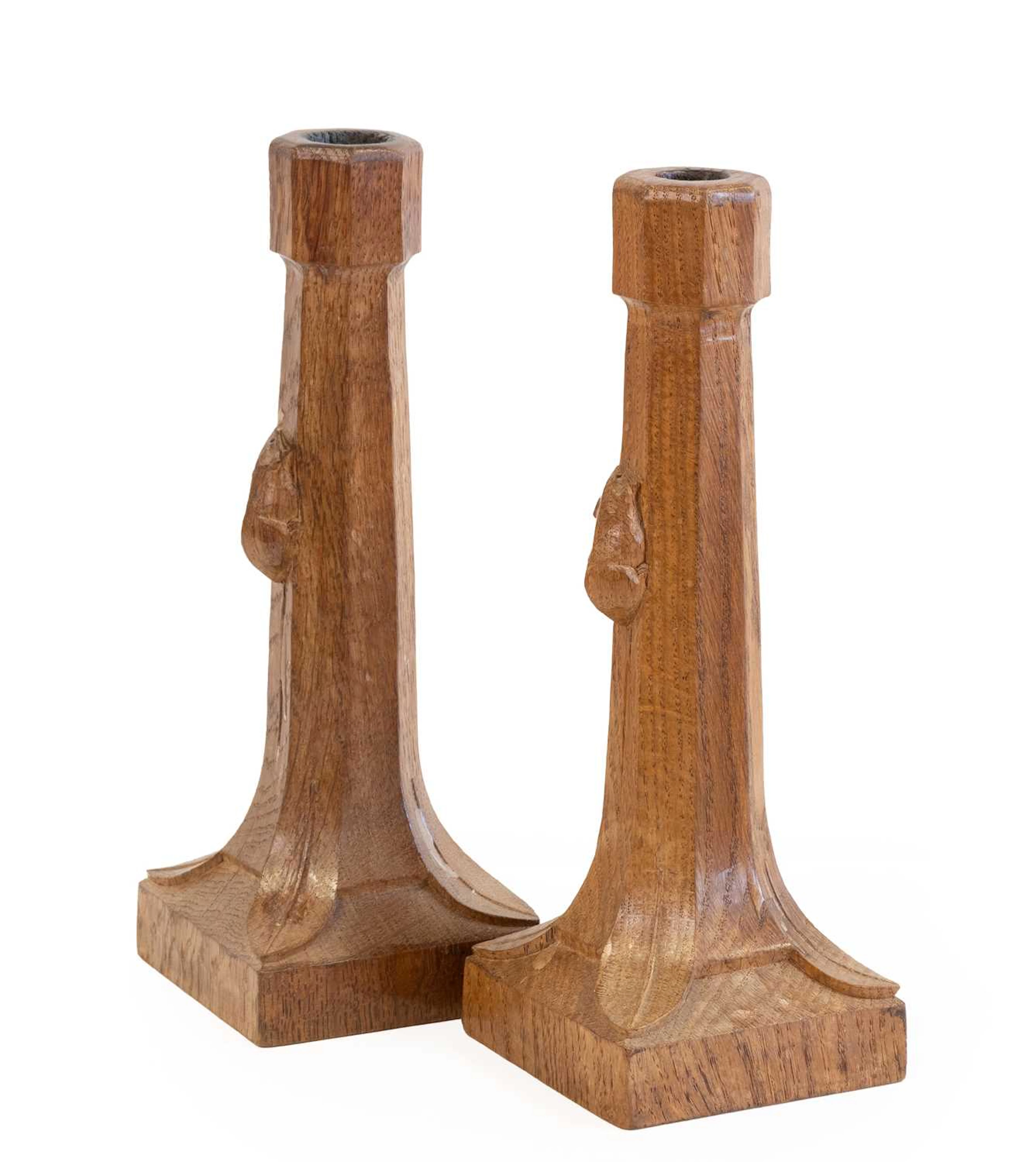 Workshop of Robert Mouseman Thompson (Kilburn): Two English Oak Candlesticks