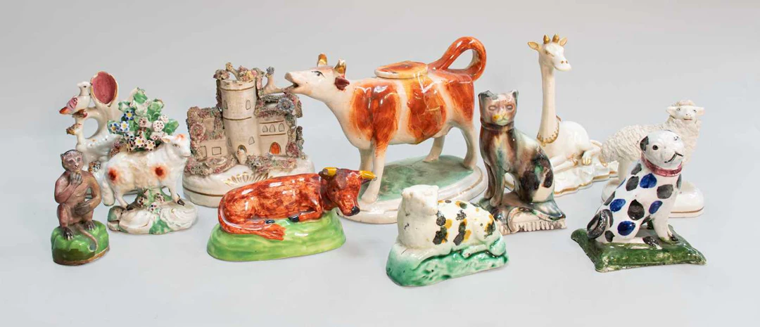 A Grainger, Lee & Co. Worcester Porcelain Model of a Seated Giraffe