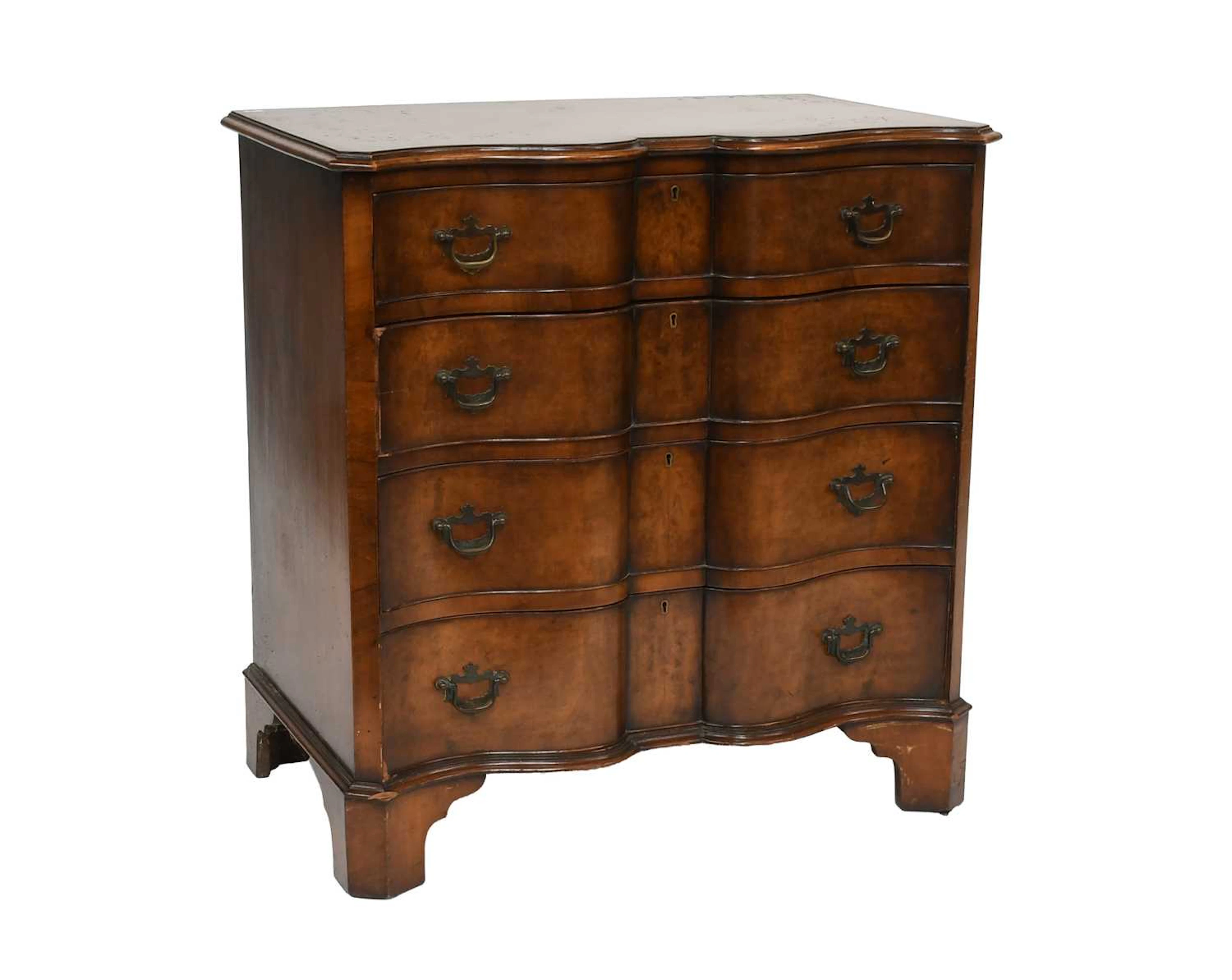 A Reproduction Walnut Serpentine Fronted Chest of Drawers