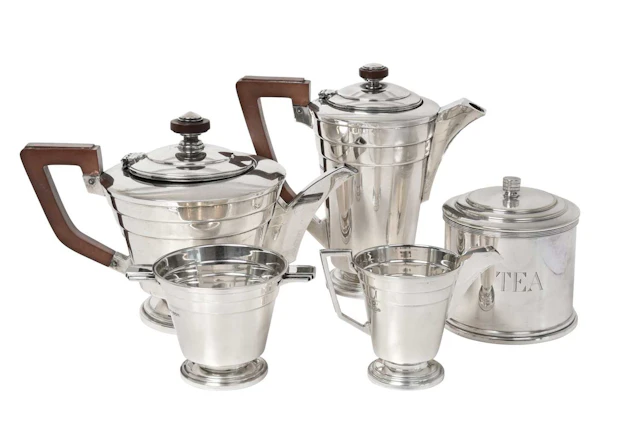 A Four-Piece George VI Silver Tea-Service by Walker and Hall, Sheffield