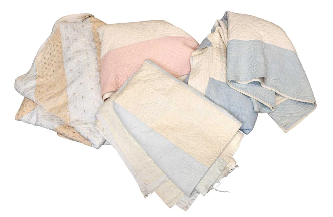 Two Similar Late 19th Century Pale Blue and White Stripy Quilts