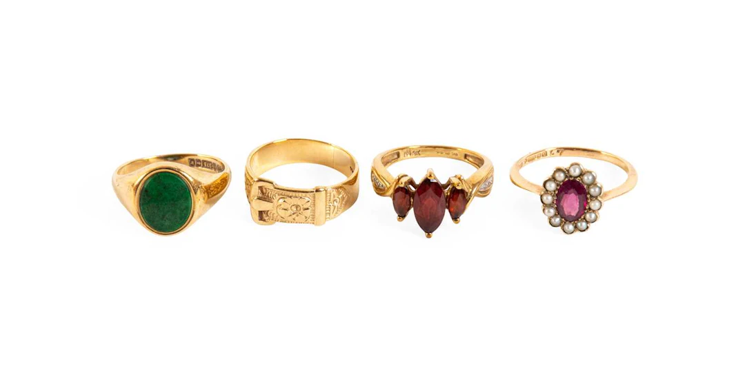 A 9 Carat Gold Garnet and Diamond Ring, A 9 Carat Gold Buckle Ring