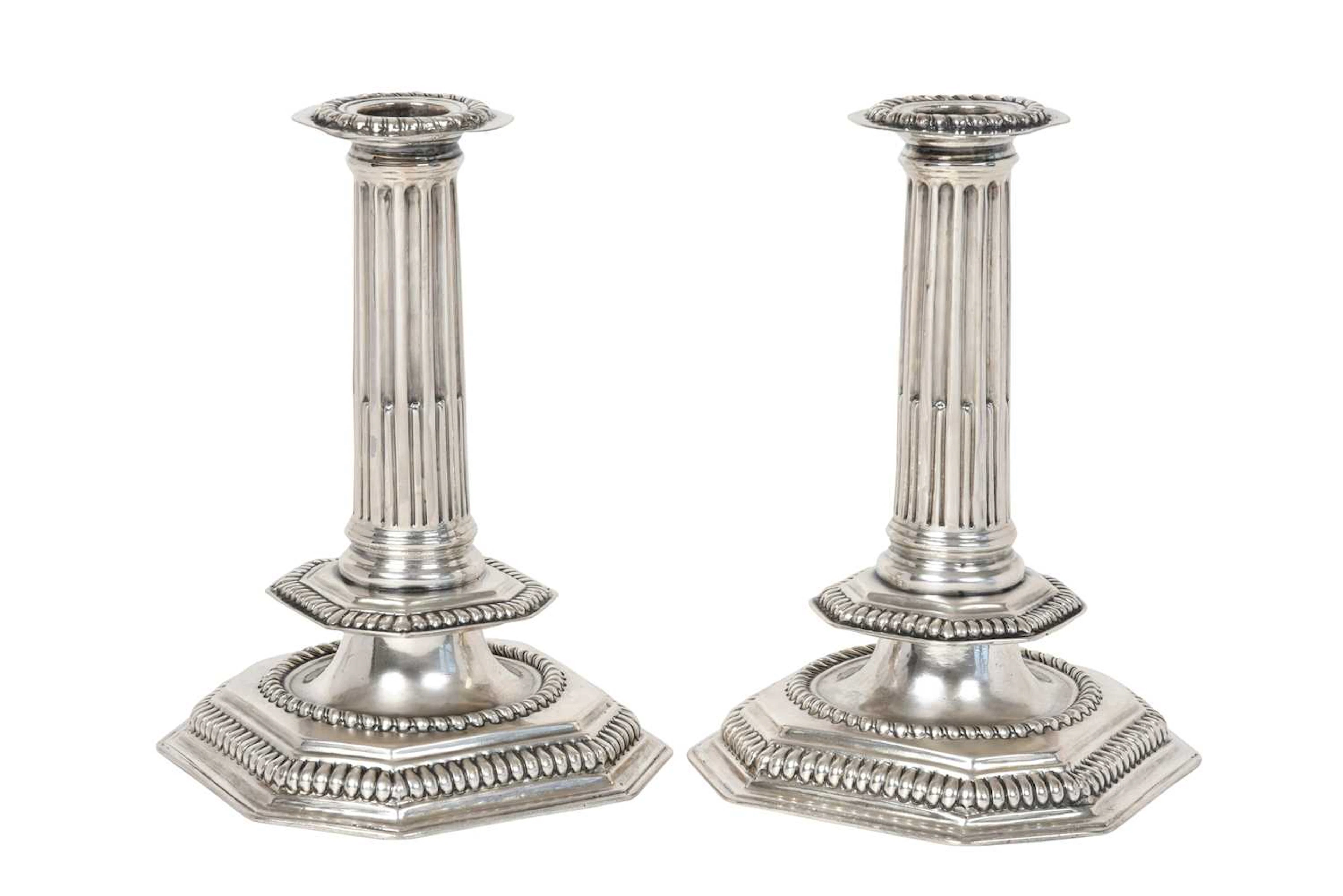 A Pair of William and Mary Silver Candlesticks by Thomas Ash, London