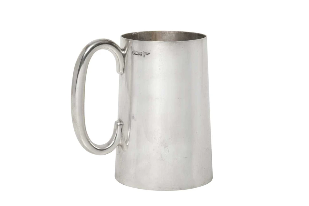 A George V Silver Mug by Walker and Hall, Sheffield, 1911, by Walker