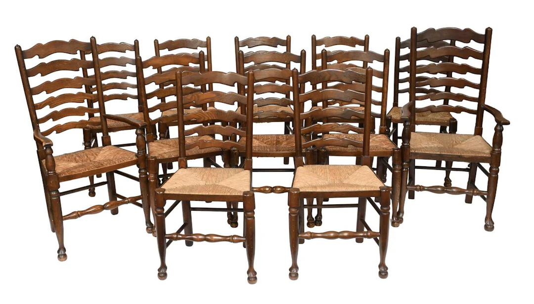 A Set of Twelve Reproduction Oak Ladder Back Dining Chairs