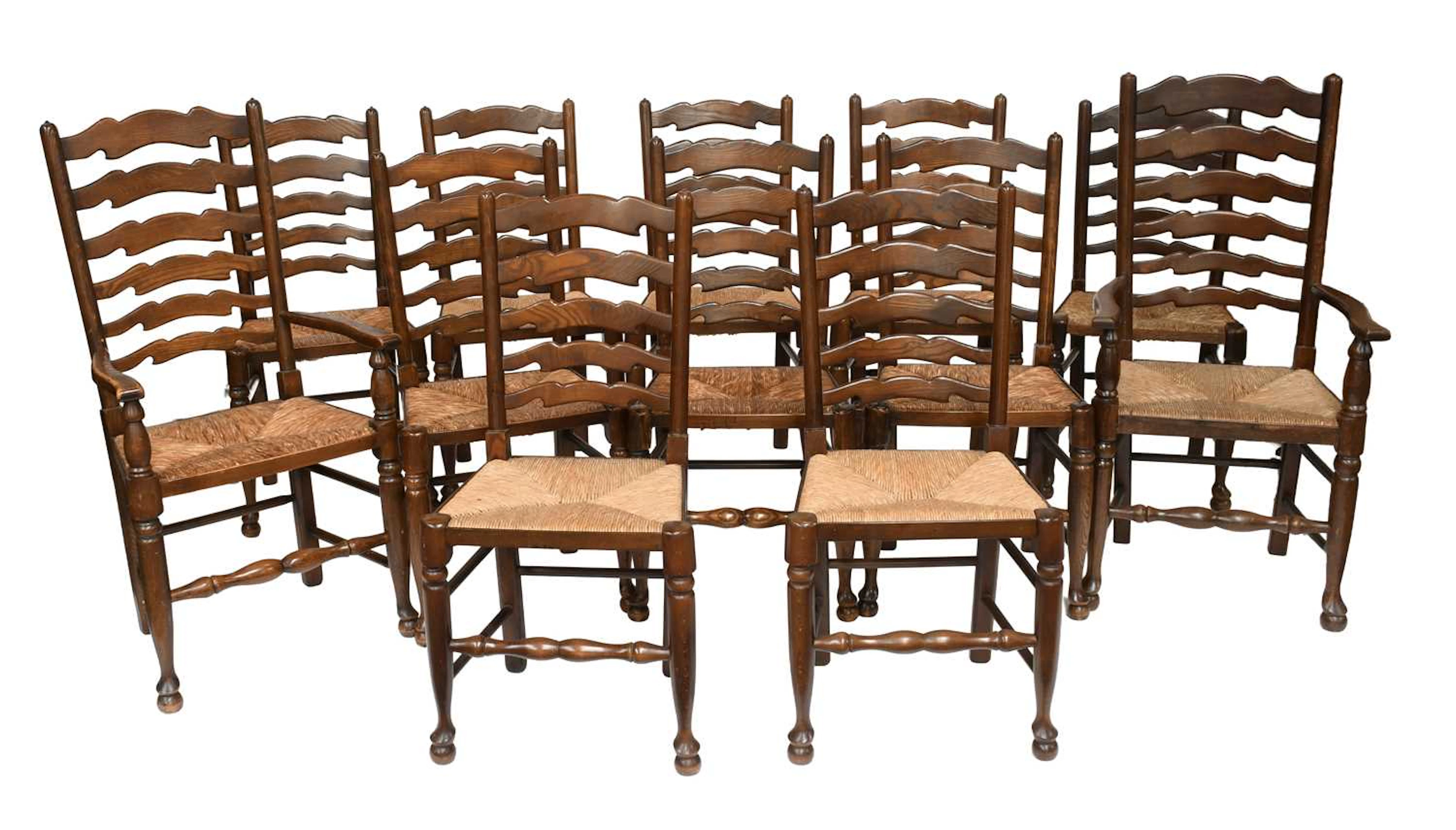 A Set of Twelve Reproduction Oak Ladder Back Dining Chairs