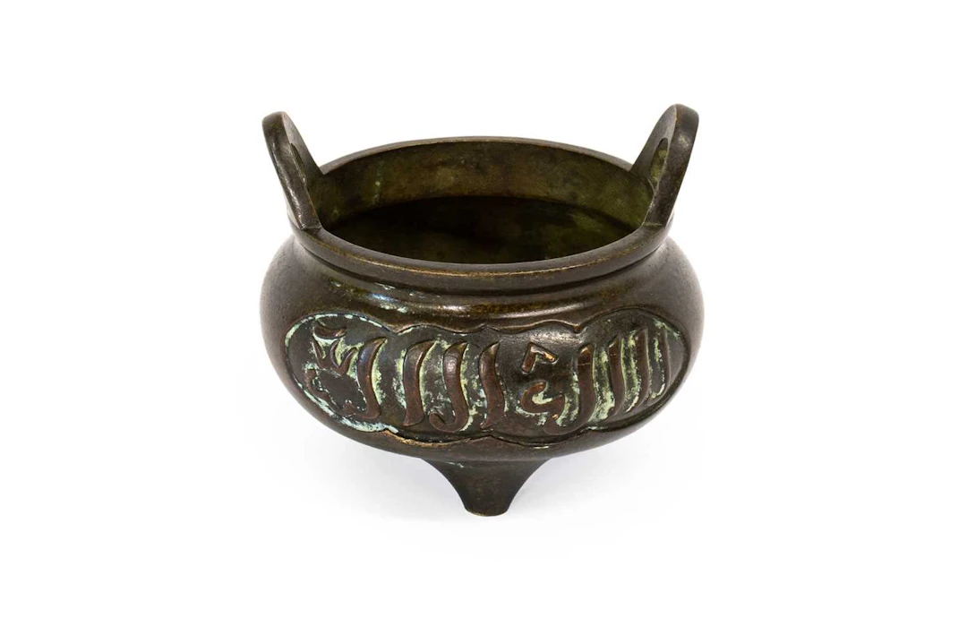 A Chinese Bronze Tripod Censer, Xuande reign mark but not of the period