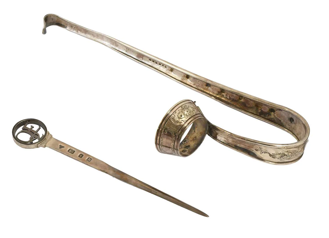 An Elizabeth II Silver Paper-Knife, by Garrard, London, 1987, Together With