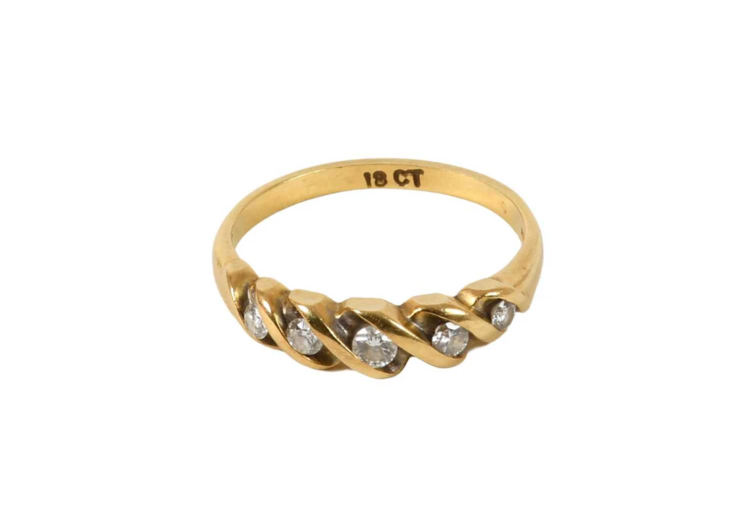 A Diamond Five Stone Ring