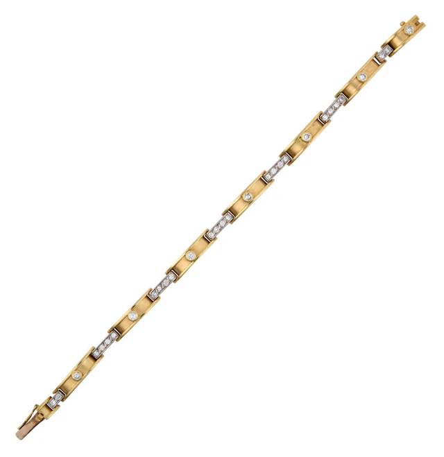 An 18 Carat Gold Diamond Bracelet