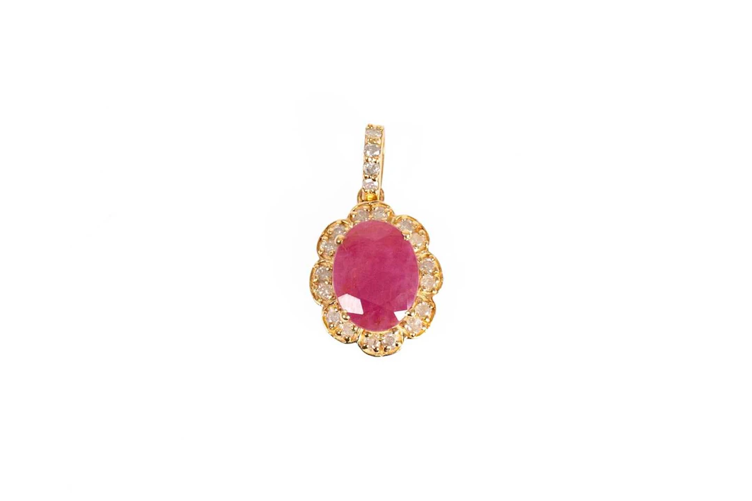 A Red Stone and Diamond Cluster Pendant