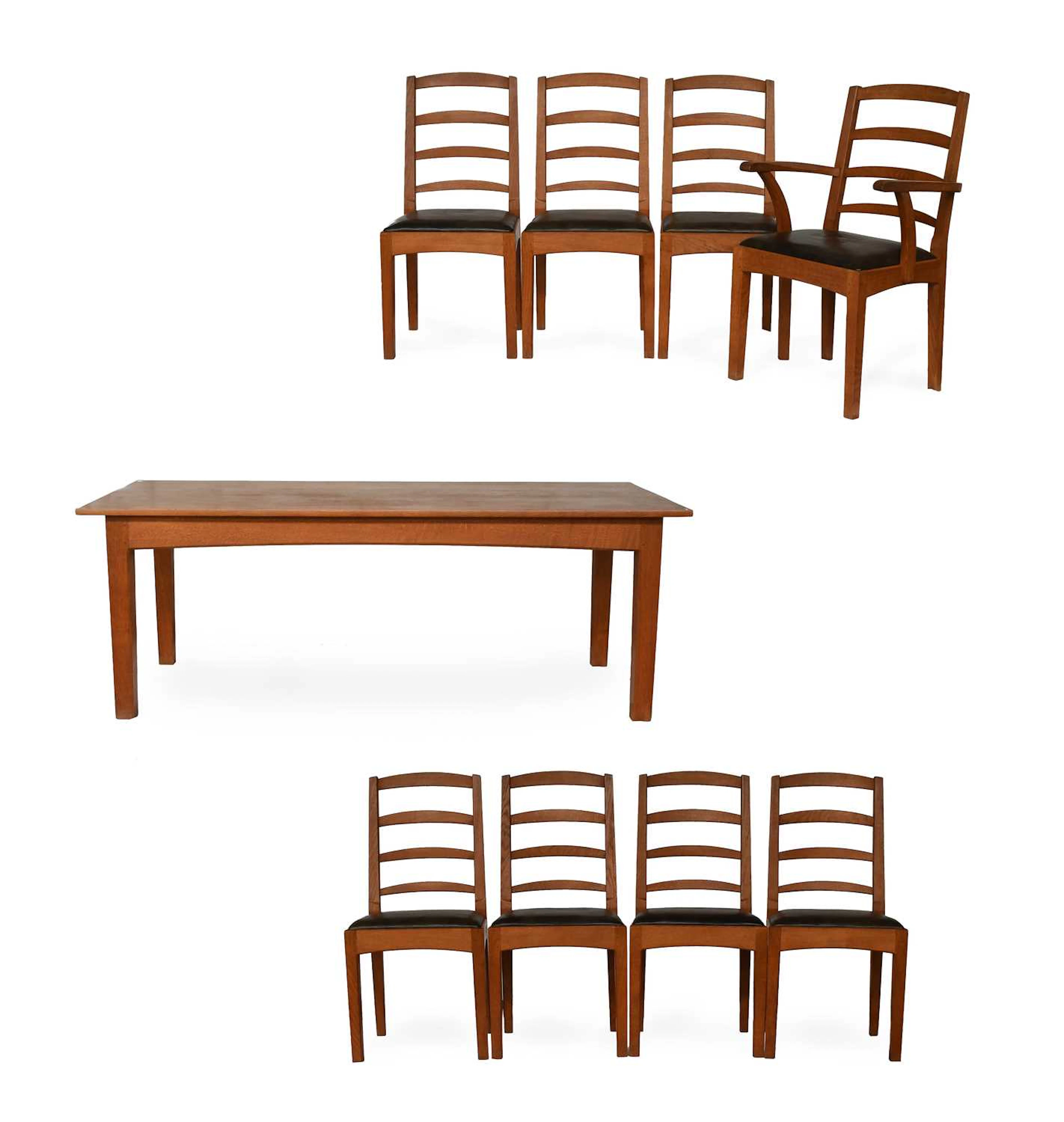 Peter Hall & Son of Staveley: An English Oak Dining Room Suite, A