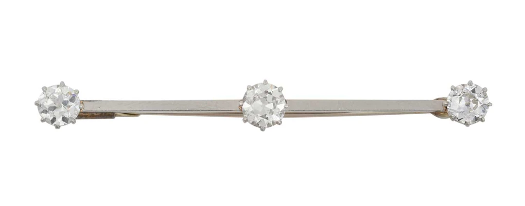 A Diamond Three Stone Bar Brooch