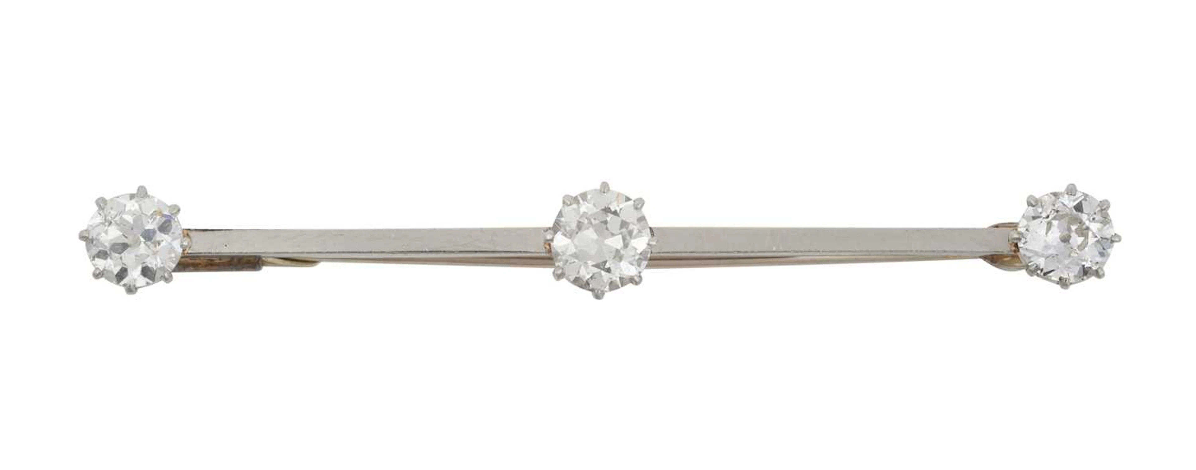 A Diamond Three Stone Bar Brooch