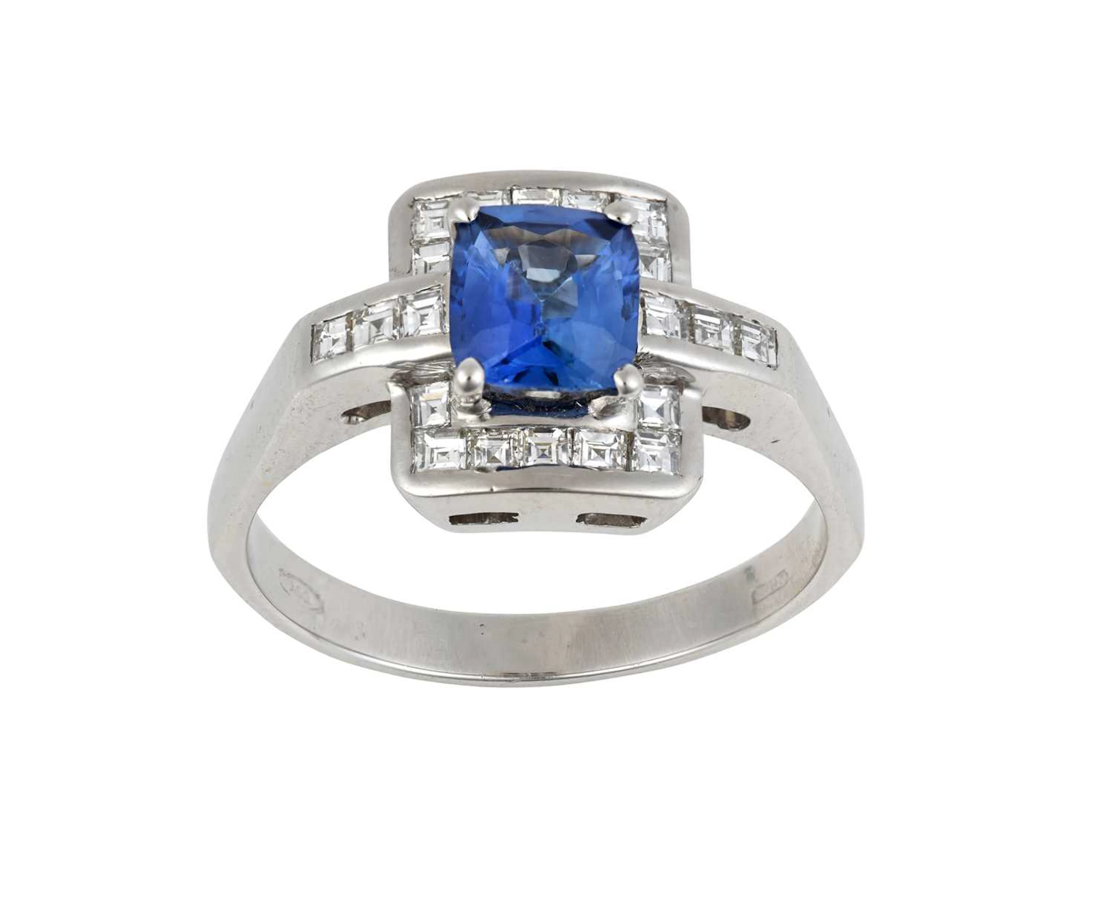 A 14 Carat White Gold Sapphire and Diamond Cluster Ring
